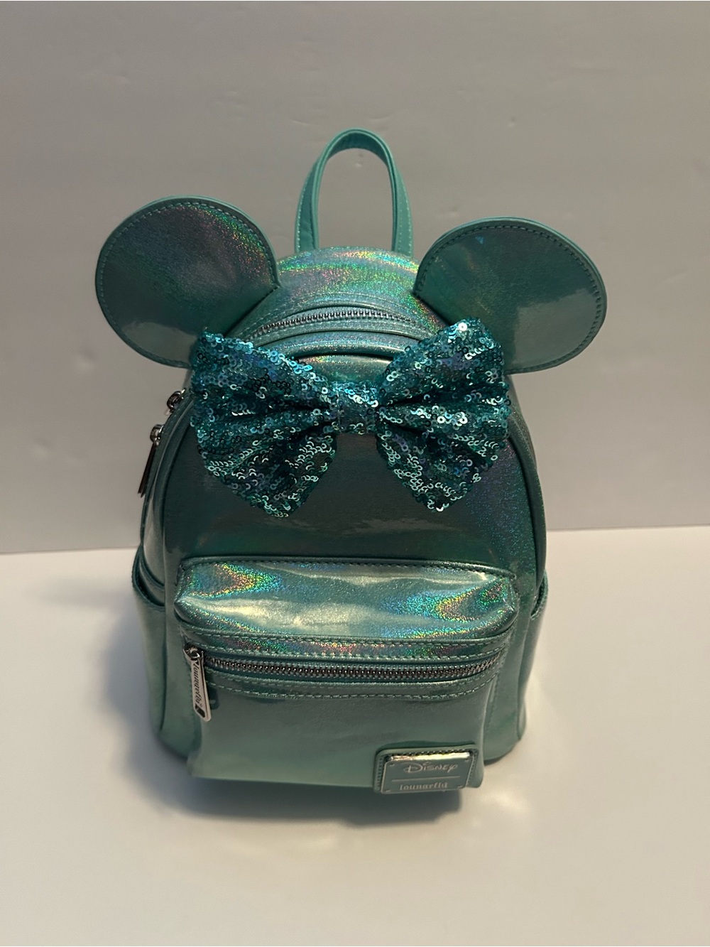Loungefly Disney Teal / Aqua Blue Glittery iridescent Sequin Bow mini backpack n